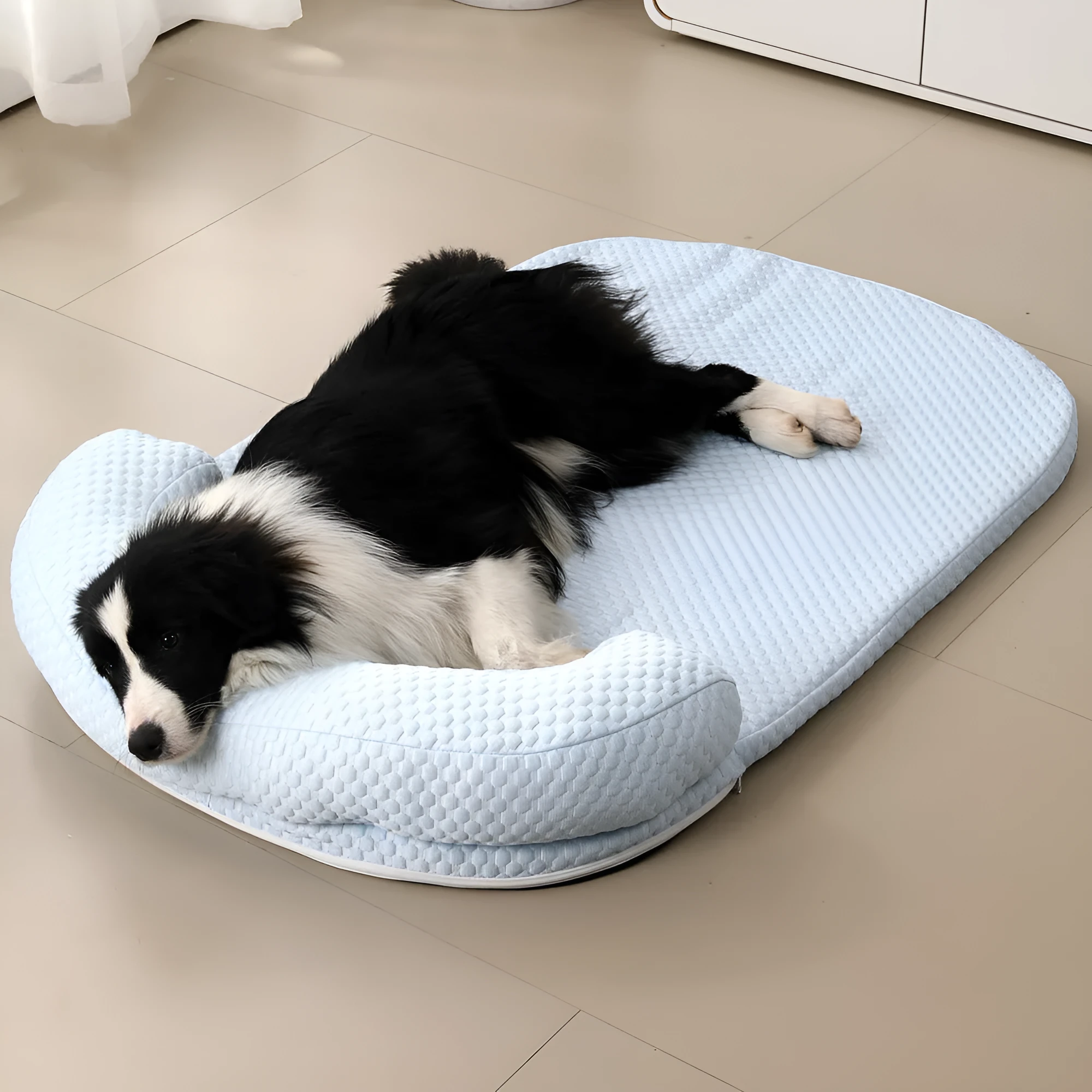 Summer pet cooling mat in blue with breathable ice peas fabric for dogs, shown on a flat surface.