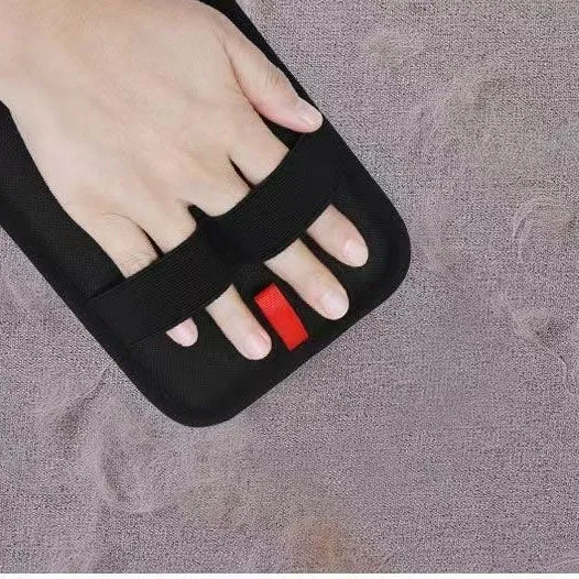 Black EVA pet hair removal brush for cleaning fur from fabric surfaces