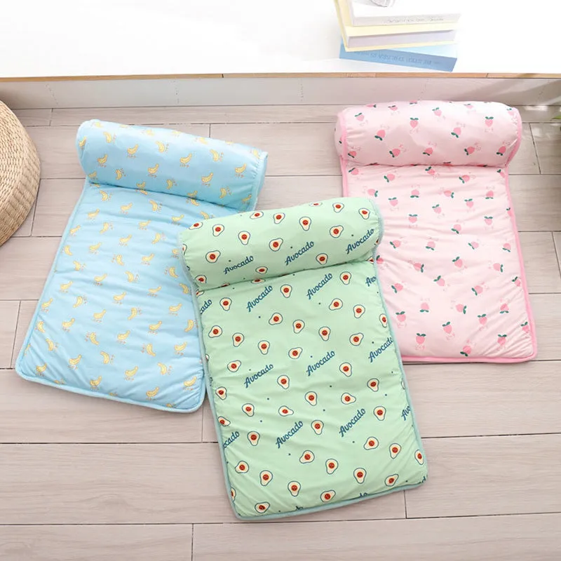 Blue cooling dog mat on floor with small dog lying on it, breathable ice silk cotton surface