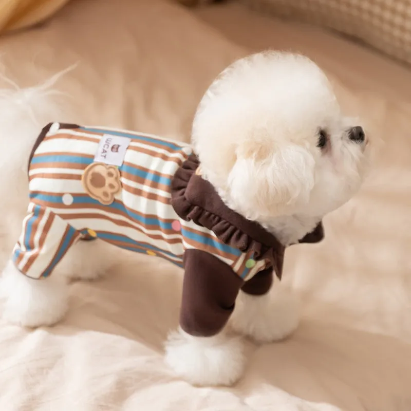 Brown small dog onesie with bear-embroidered ruffled collar, striped blue and brown body, and paw print patch