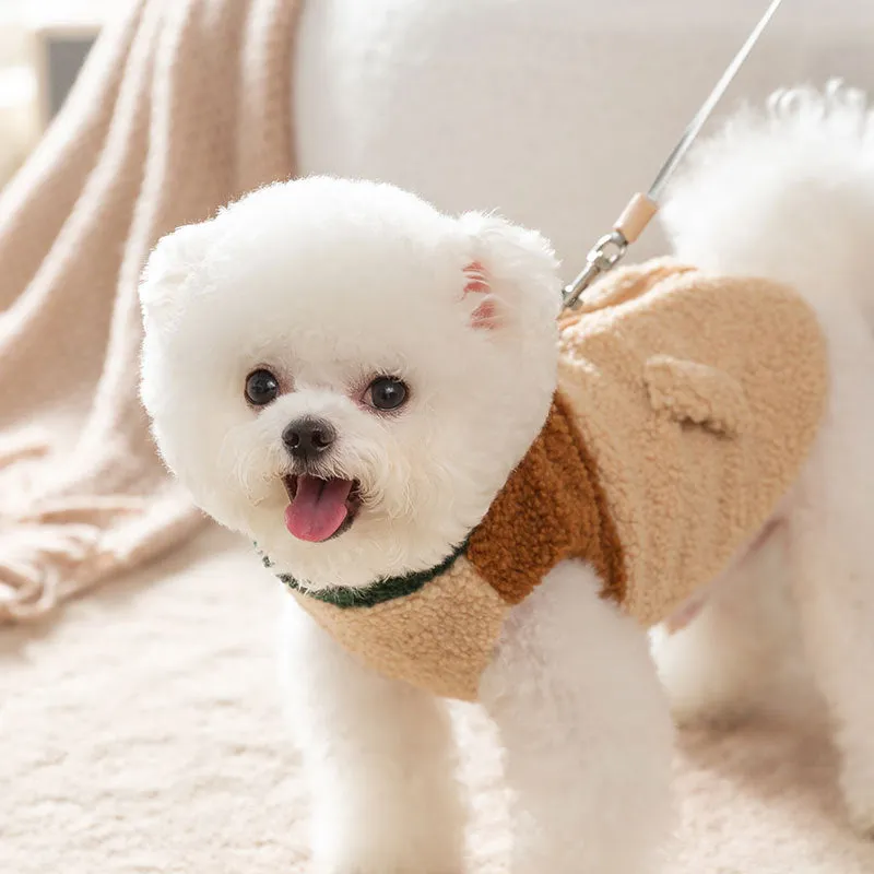 Colour-block pet fleece jacket with squirrel patch, leash ring, and pockets in green, brown, and beige on a small dog.