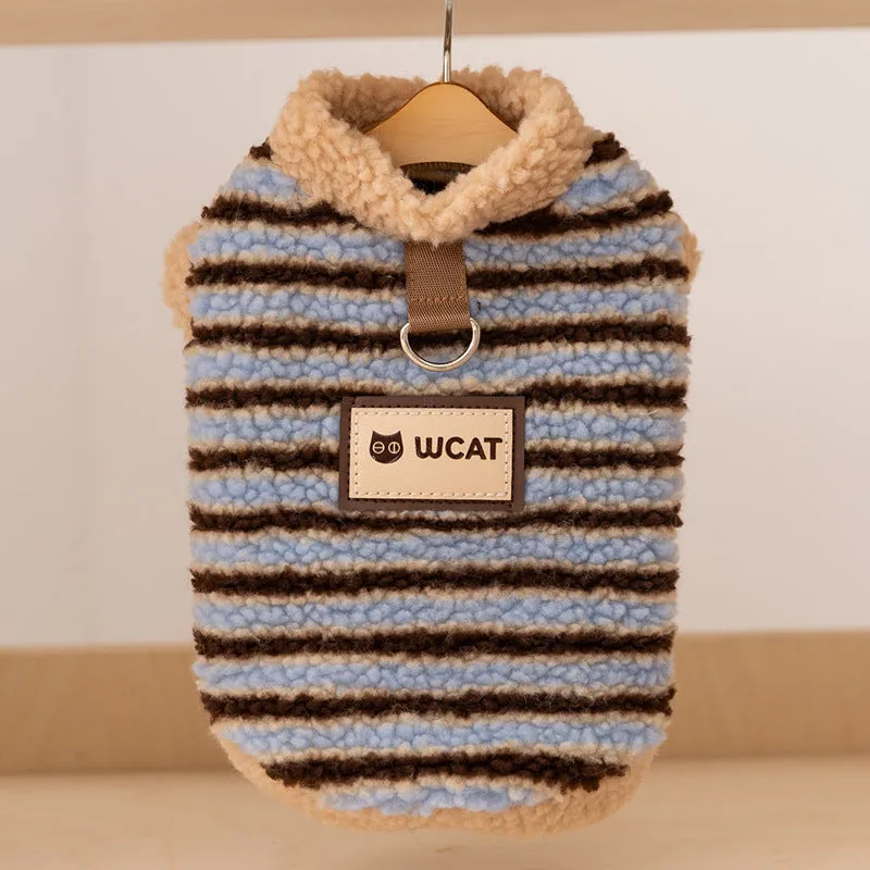 Yellow striped lambskin fleece dog clothing with bear patch and leash ring on a small dog