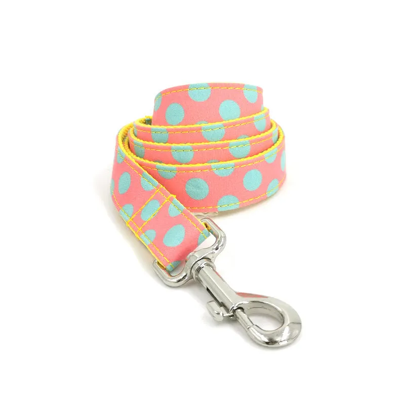 Yellow polka dot dog collar and lead set with bow accents and five size options