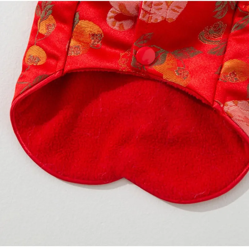 Red cheongsam pet vest with decorative knot buttons, floral and fruit patterns, for Lunar New Year