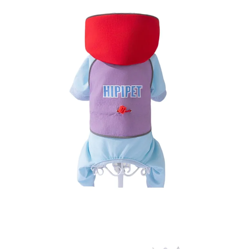 Waterproof 4-leg dog jumpsuit with hood in blue on a dog, reflective details visible