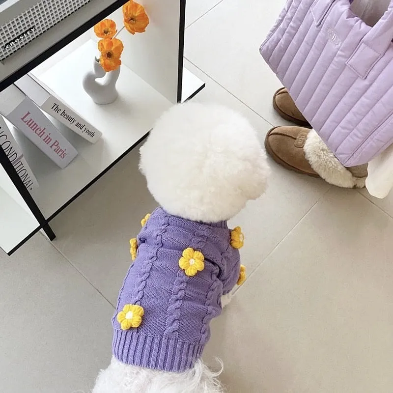 Purple knitted dog clothing with floral pattern showing size options for small pets