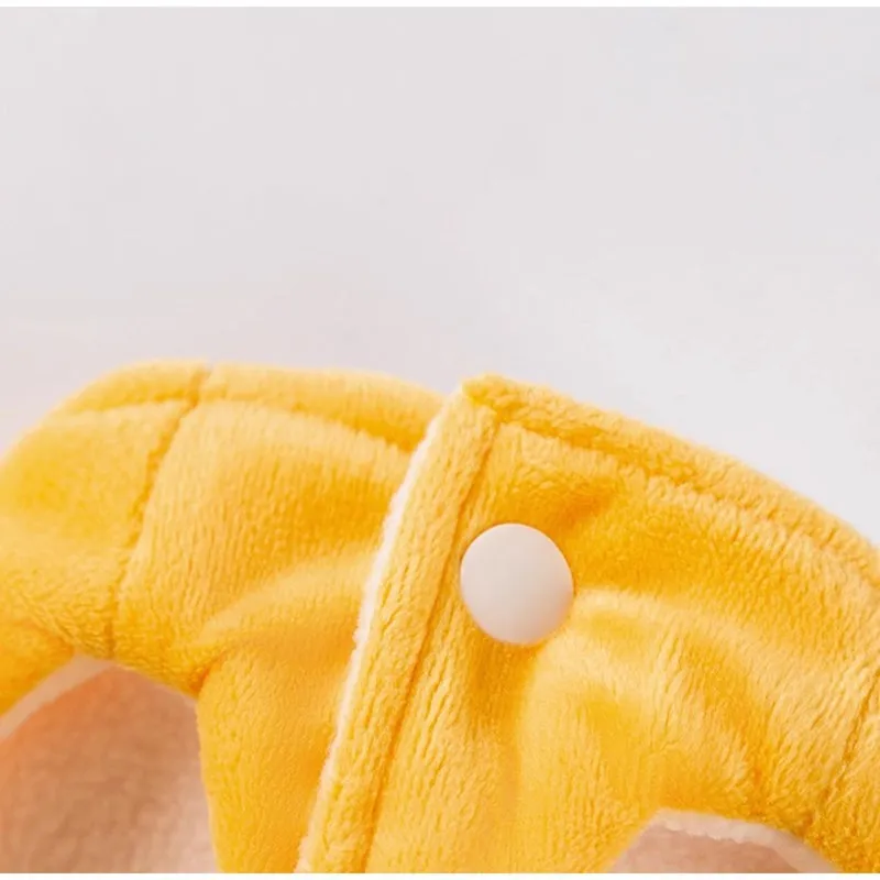 Yellow onsen fish pet costume with fish-shaped hat and vest on a dog with leash ring