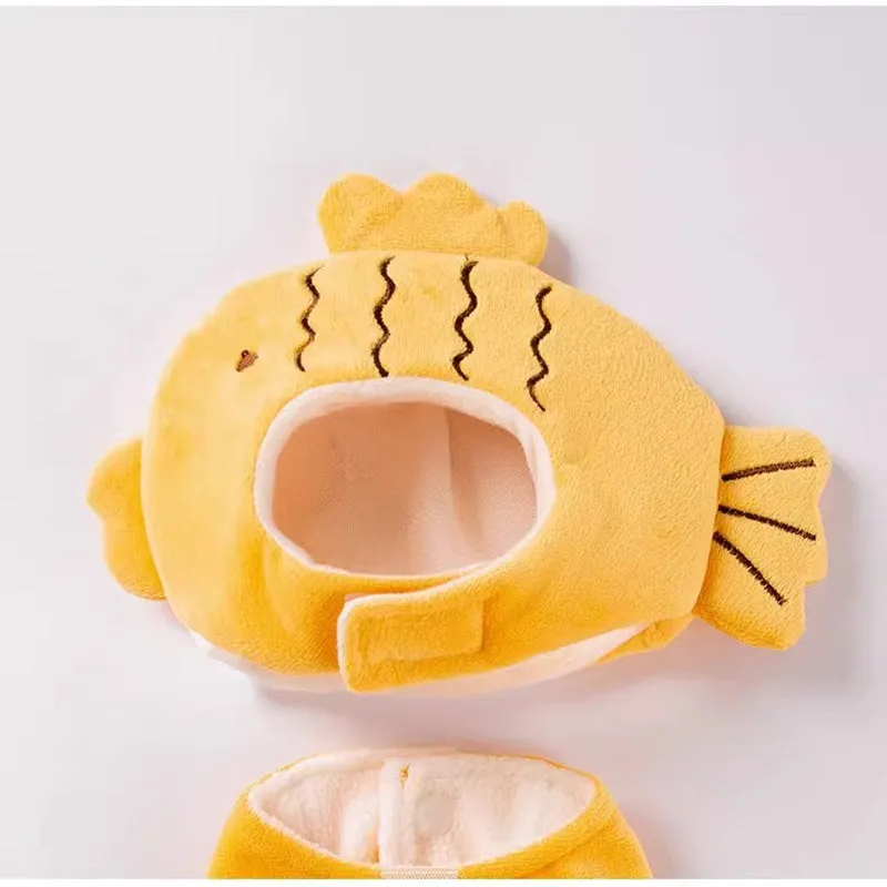 Yellow onsen fish pet costume with fish-shaped hat and vest on a dog with leash ring