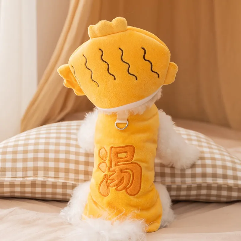Yellow onsen fish pet costume with fish-shaped hat and vest on a dog with leash ring