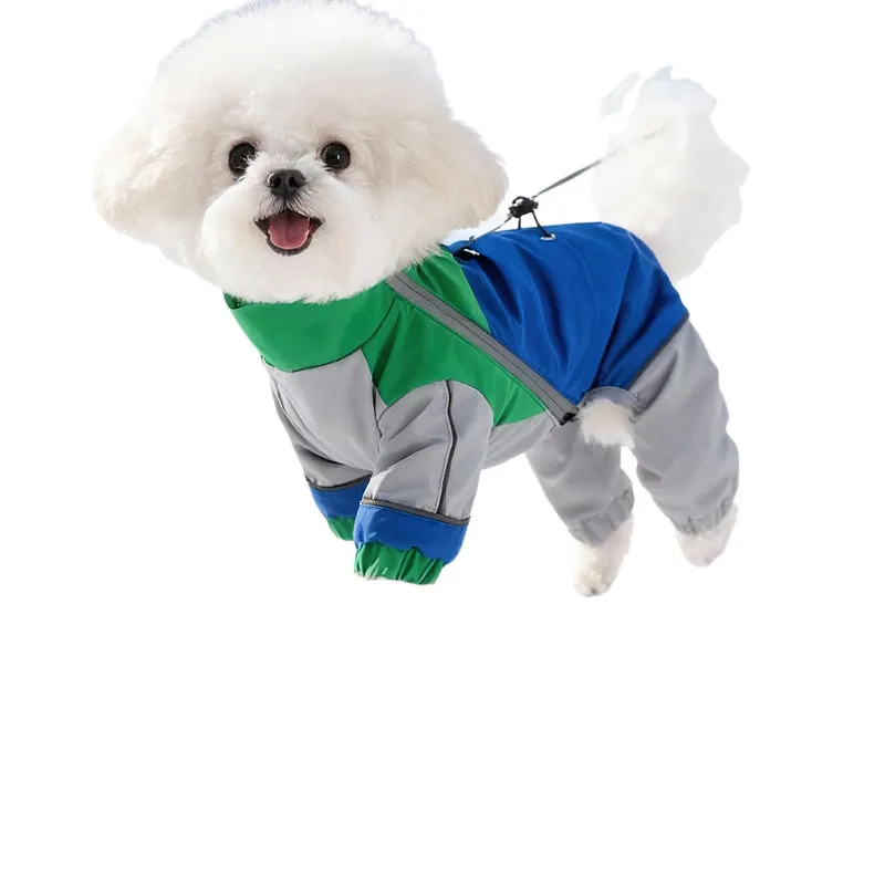 Reflective colour block dog jumpsuit in blue with waterproof fabric, four-leg coverage, and adjustable drawstrings on a small dog