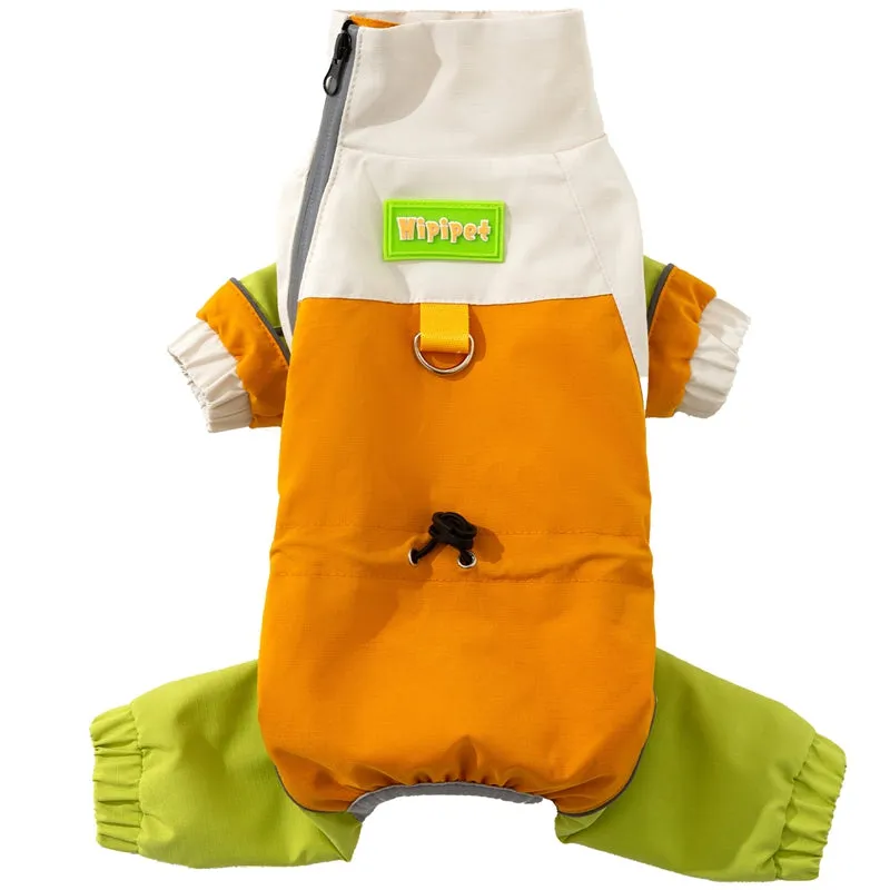 Reflective colour block dog jumpsuit in blue with waterproof fabric, four-leg coverage, and adjustable drawstrings on a small dog