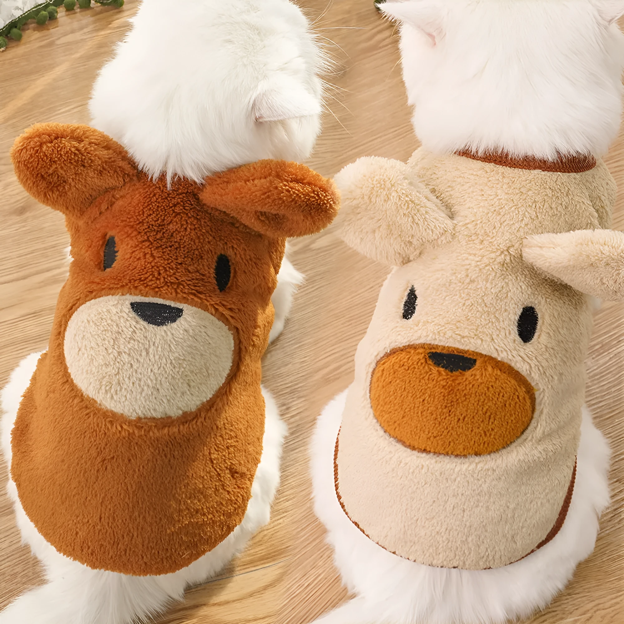 Fleece-lined warm dog clothes in cream with brown bear ears on a small dog