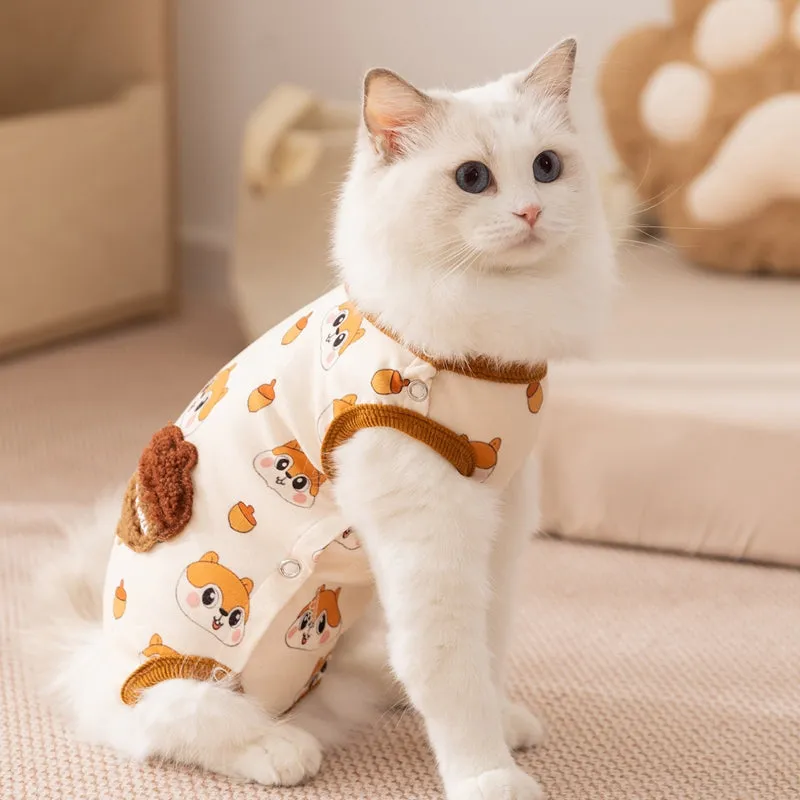 Small dog wearing Chip 'n' Dale themed cream onesie with yellow trim and embroidered acorn pocket