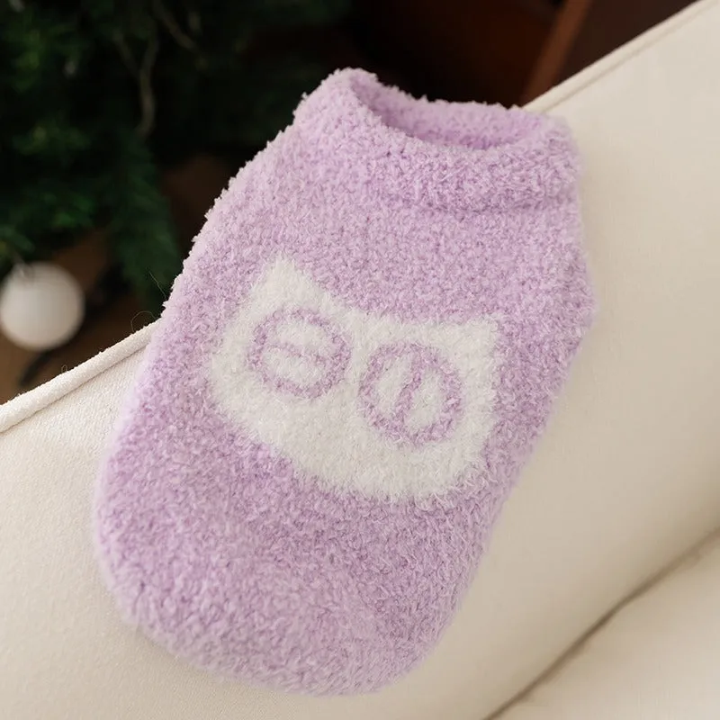 Cute blue and purple owl pattern pet sweater on a small cat or dog for winter