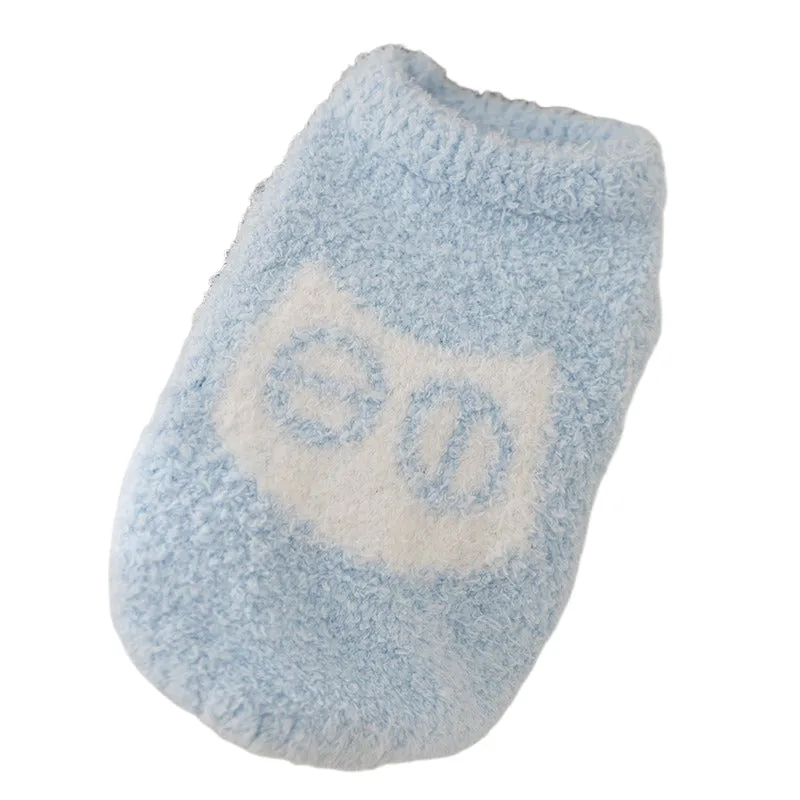 Cute blue and purple owl pattern pet sweater on a small cat or dog for winter
