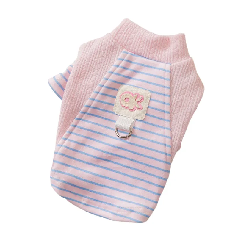 Cute striped dog shirt with metal belt loop, green and blue-green stripes, on a small dog