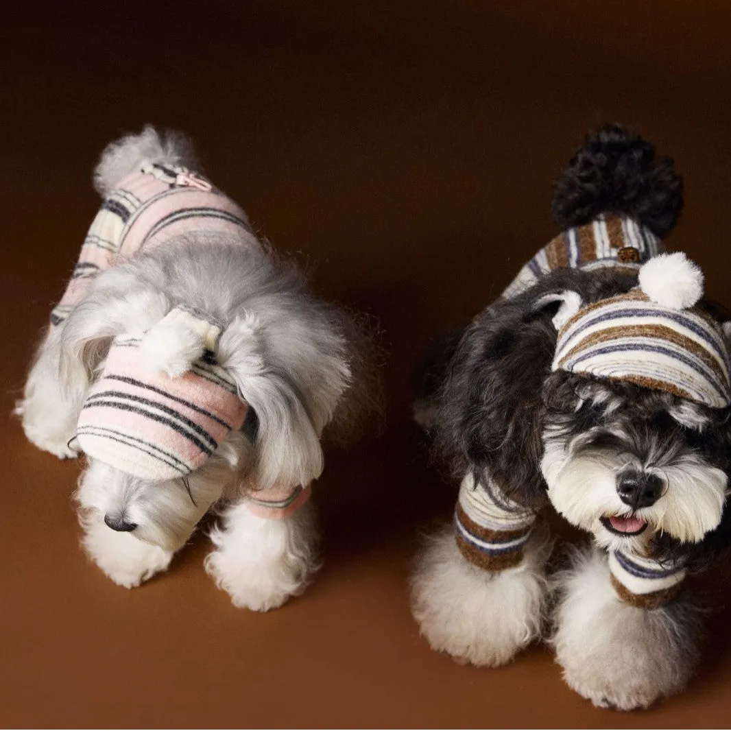 Striped fur ball acrylic dog hat in pink and coffee colours on display showing side view