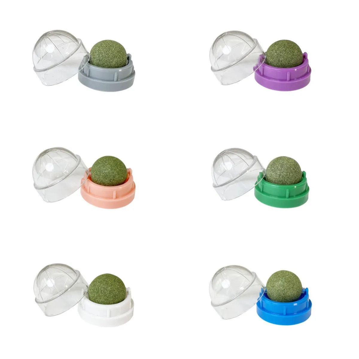 Rotating catnip ball cat toy in white with molar rod on light surface
