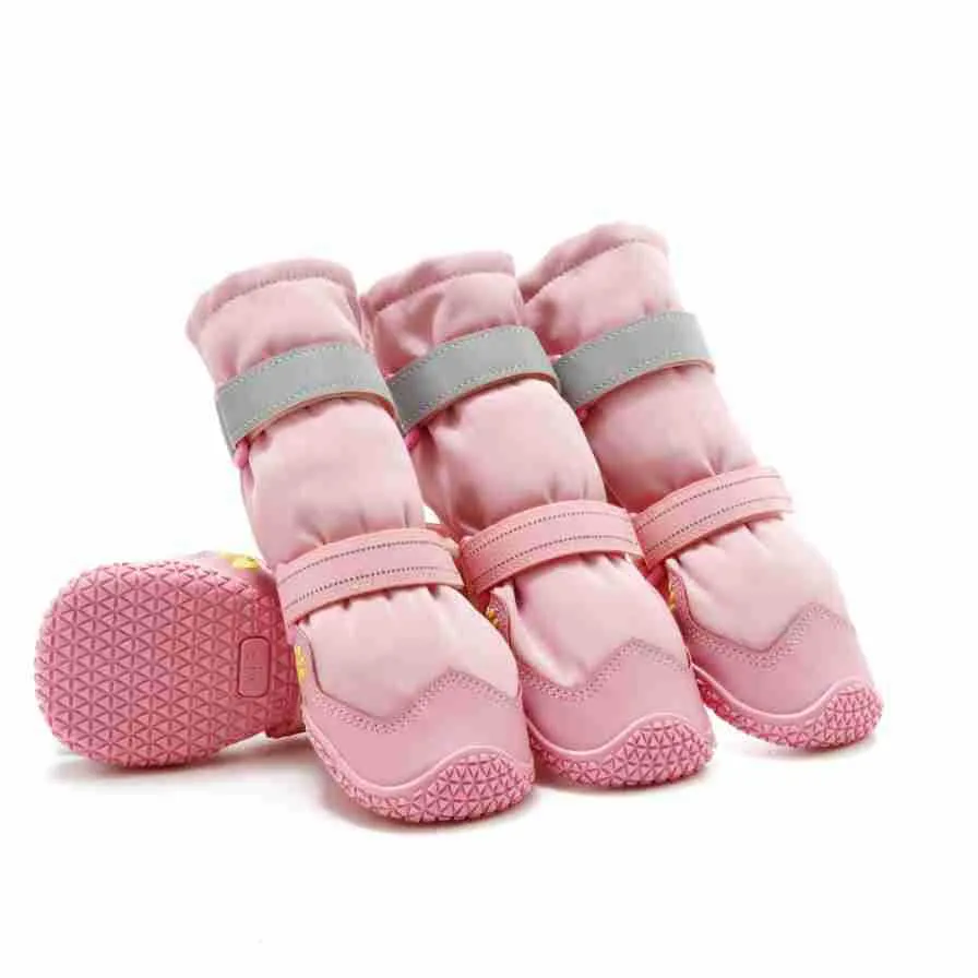 Extended medium large dog shoes with non-slip rubber sole in black waterproof style on a dog's paw