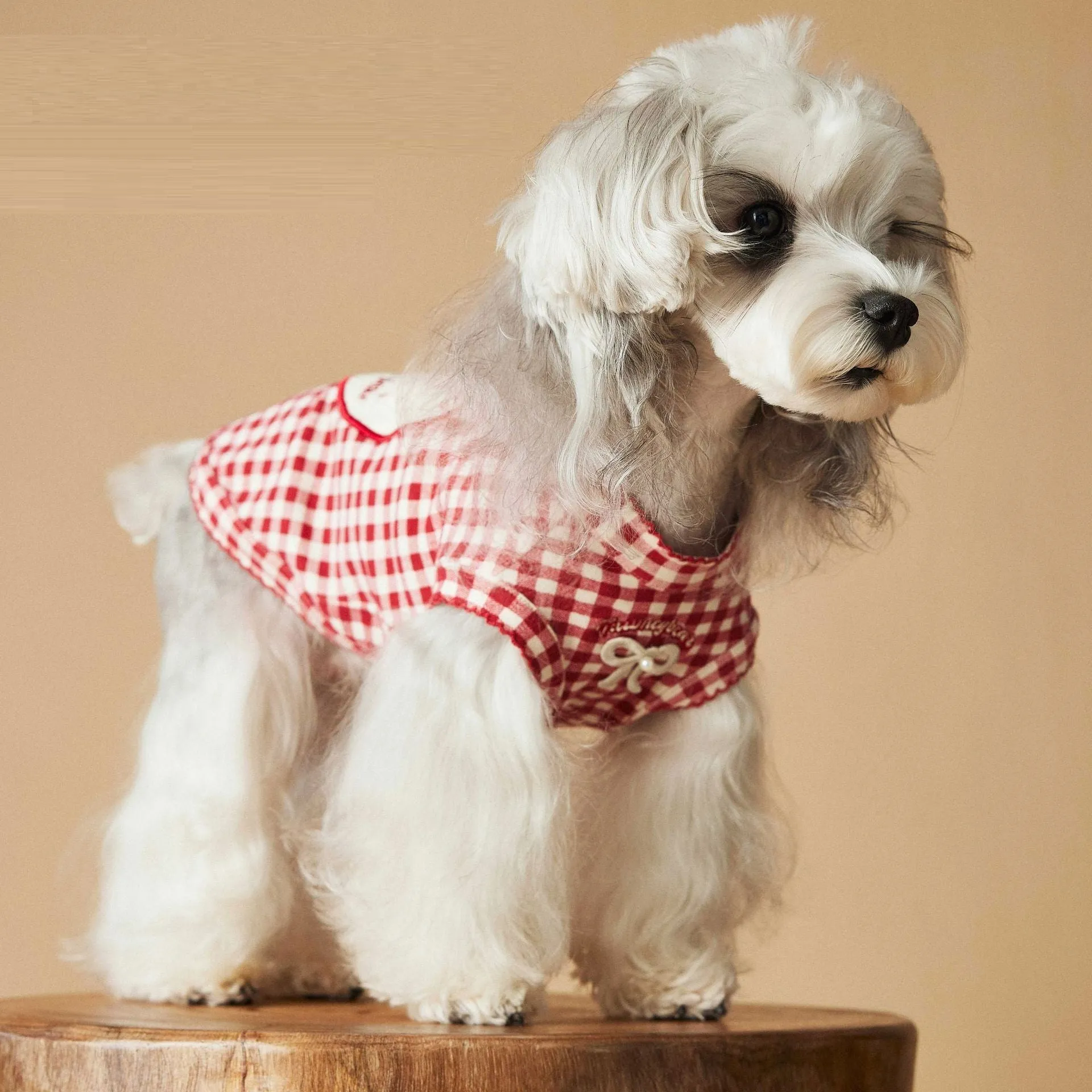 Red plaid sleeveless cotton spandex vest for small dogs on white background