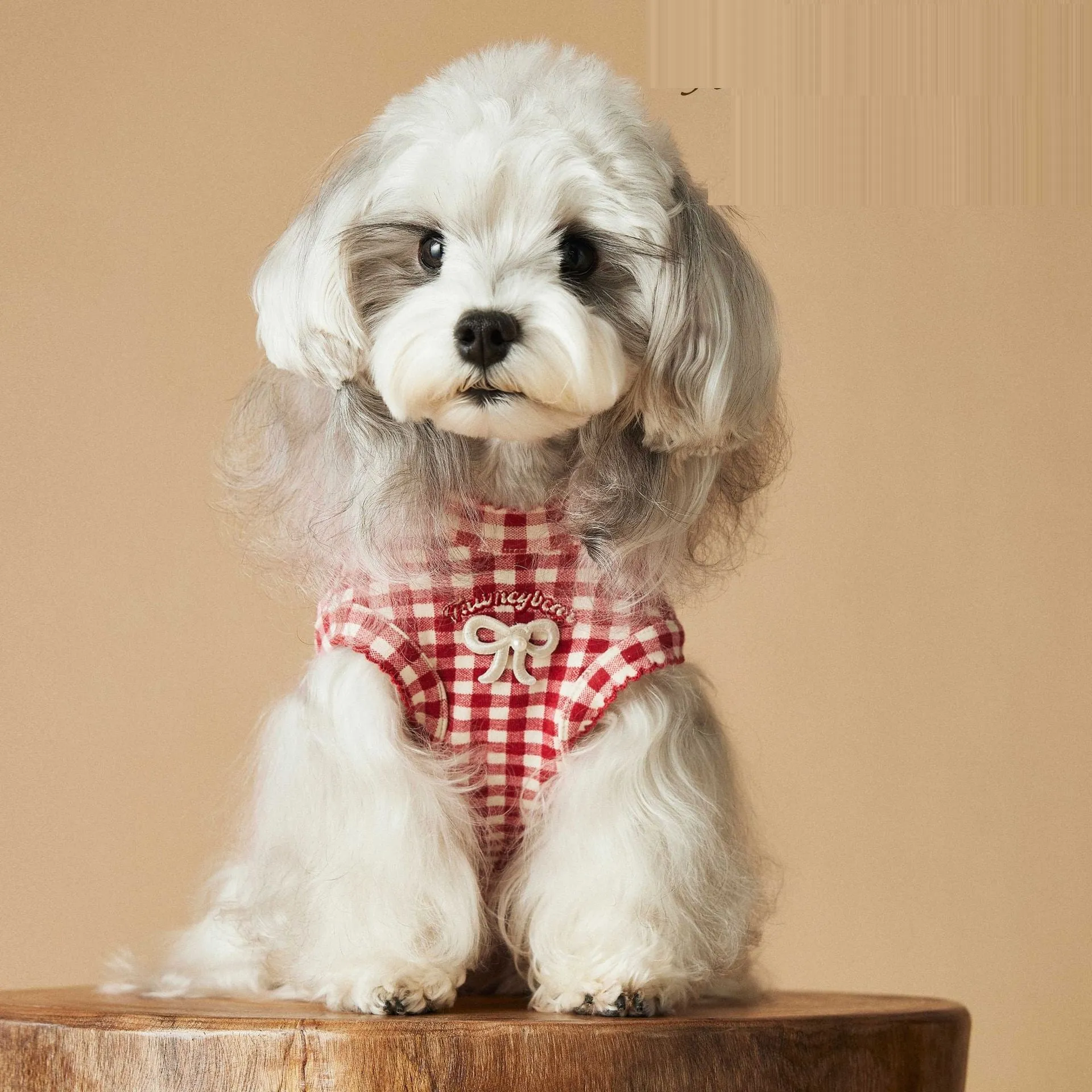 Red plaid sleeveless cotton spandex vest for small dogs on white background