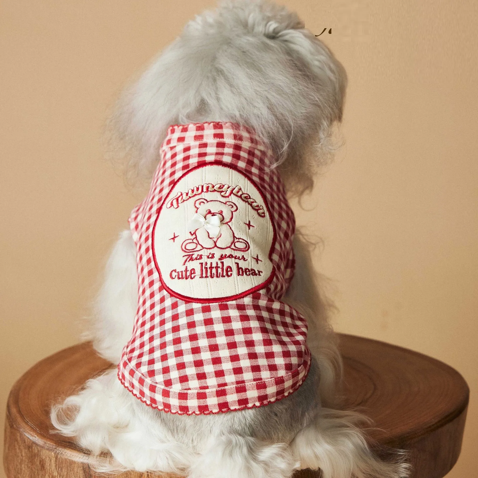 Red plaid sleeveless cotton spandex vest for small dogs on white background