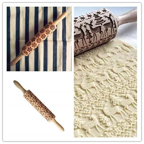 Wooden rolling pin with embossed Christmas patterns, 45cm long, on a kitchen worktop.
