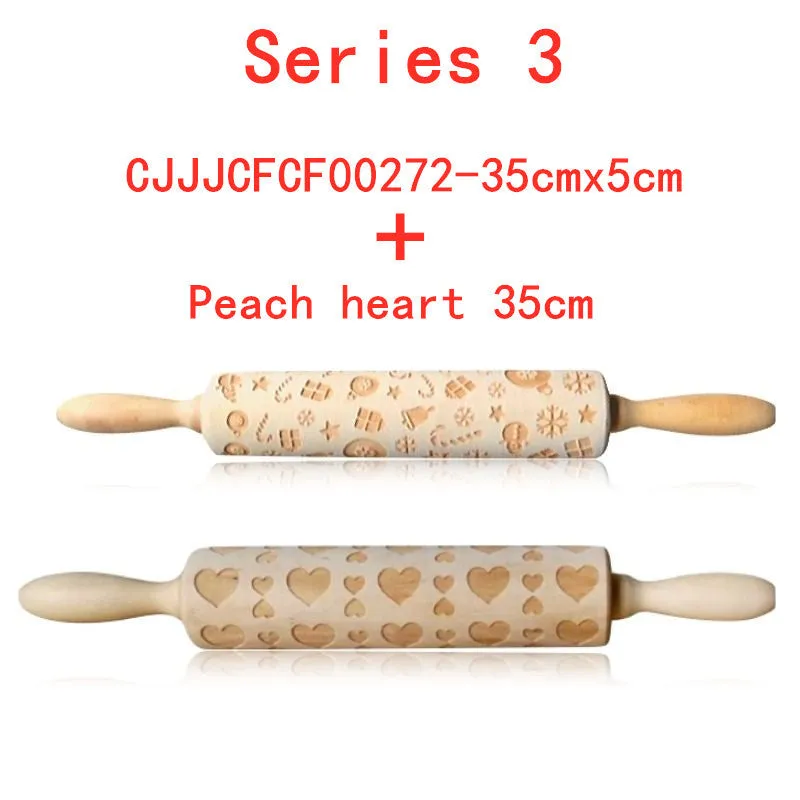 Wooden rolling pin with embossed Christmas patterns, 45cm long, on a kitchen worktop.