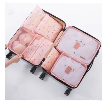 Set of six waterproof nylon packing cubes and organisers in assorted colours and sizes.