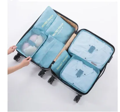 Set of six waterproof nylon packing cubes and organisers in assorted colours and sizes.