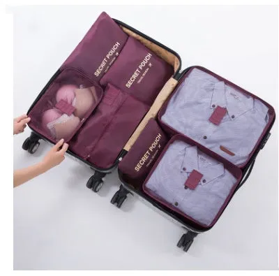 Set of six waterproof nylon packing cubes and organisers in assorted colours and sizes.
