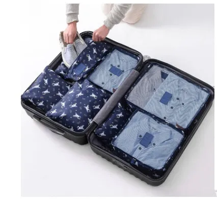 Set of six waterproof nylon packing cubes and organisers in assorted colours and sizes.