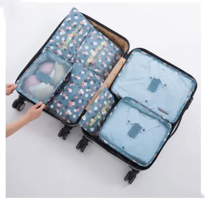 Set of six waterproof nylon packing cubes and organisers in assorted colours and sizes.