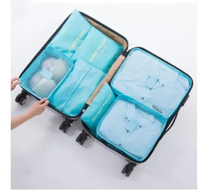 Set of six waterproof nylon packing cubes and organisers in assorted colours and sizes.