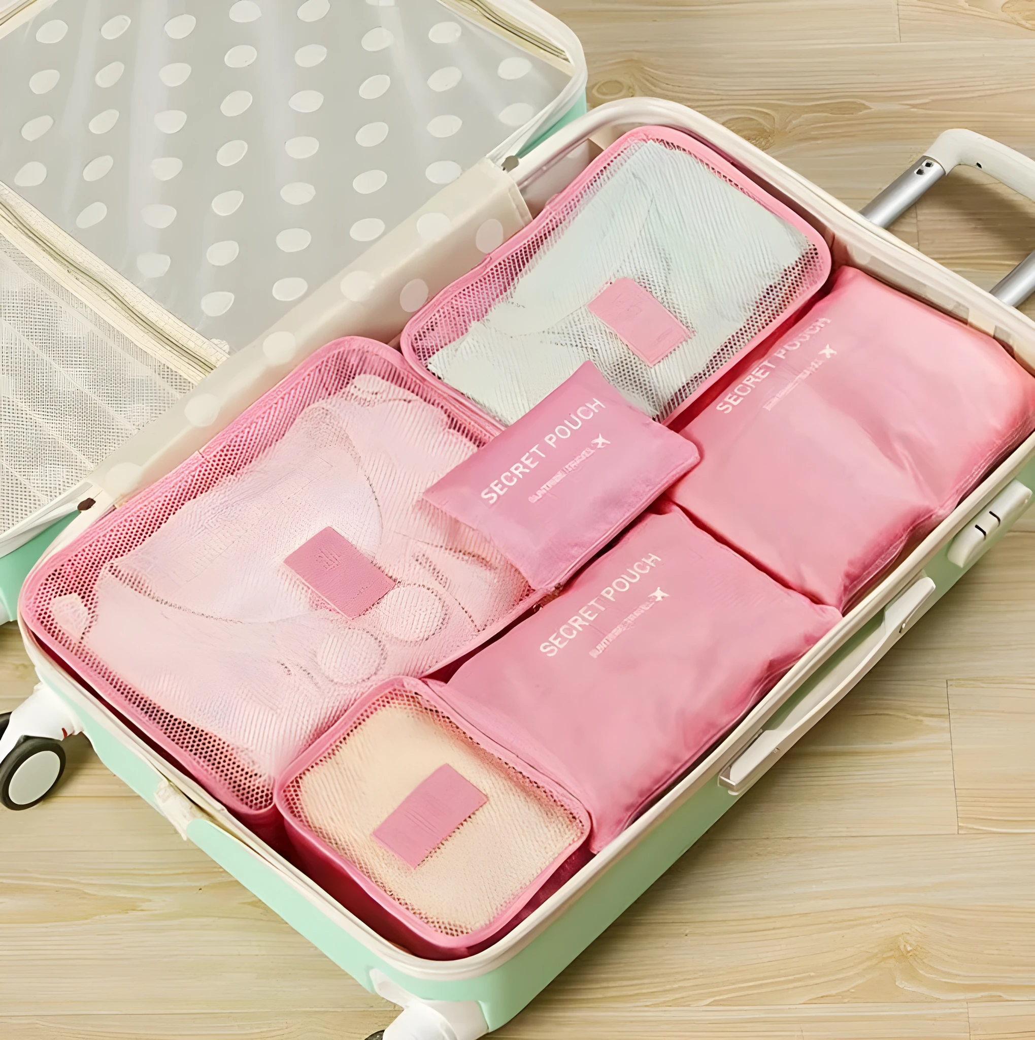 Set of six waterproof nylon packing cubes and organisers in assorted colours and sizes.