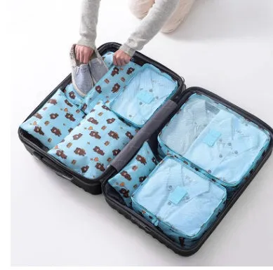 Set of six waterproof nylon packing cubes and organisers in assorted colours and sizes.