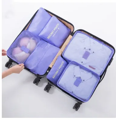 Set of six waterproof nylon packing cubes and organisers in assorted colours and sizes.