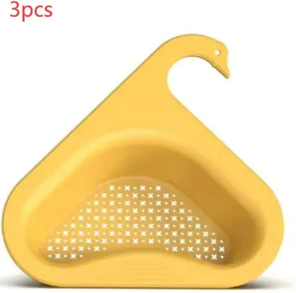 Household sink hanging fruit and vegetable drain basket in green plastic, clipped onto sink rim with slotted base