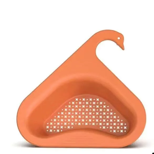 Household sink hanging fruit and vegetable drain basket in green plastic, clipped onto sink rim with slotted base