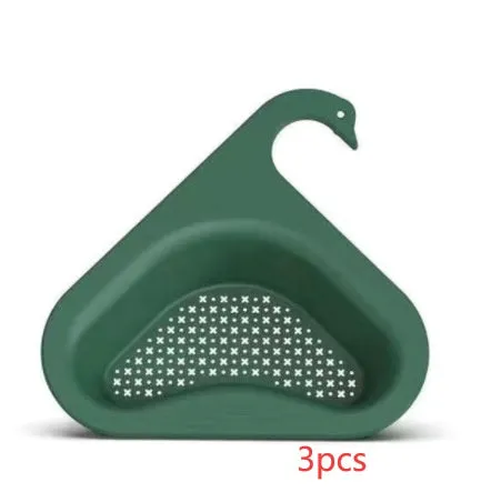 Household sink hanging fruit and vegetable drain basket in green plastic, clipped onto sink rim with slotted base