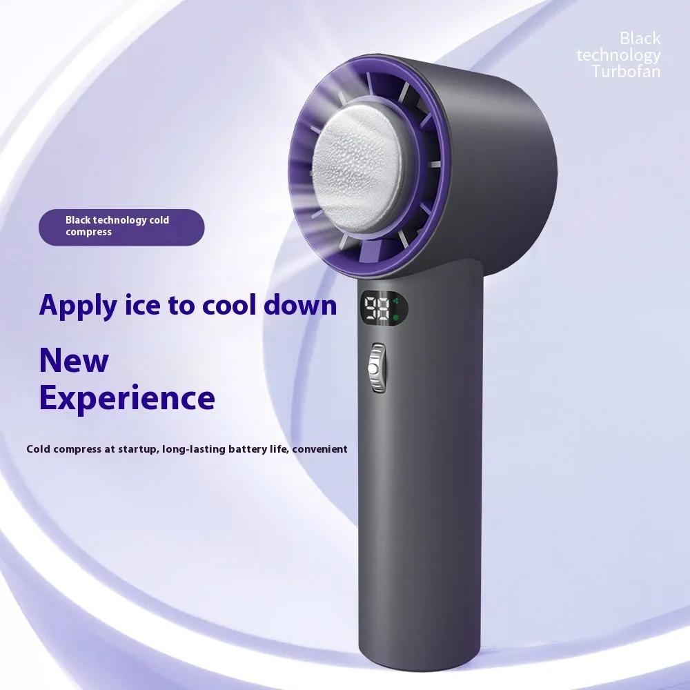 White portable handheld turbo fan with cooling function and display, shown on a table.