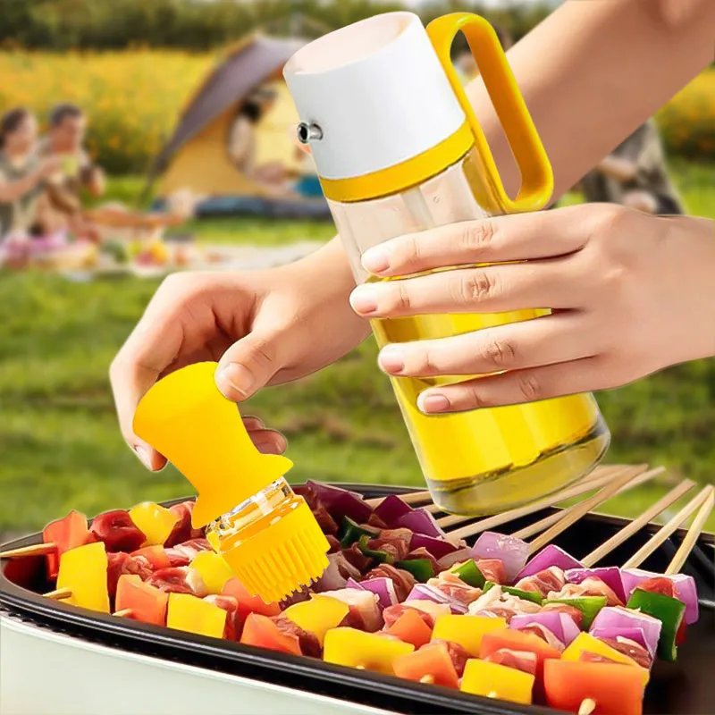Transparent glass oil dispenser with silicone brush, stainless steel nozzle, in yellow, green, or brown.