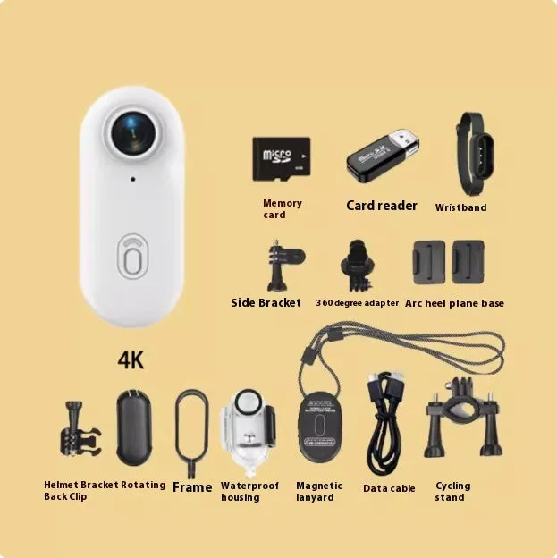 Small black 4K action camera with magnetic mount attached to a bicycle helmet.