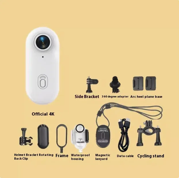 Small black 4K action camera with magnetic mount attached to a bicycle helmet.