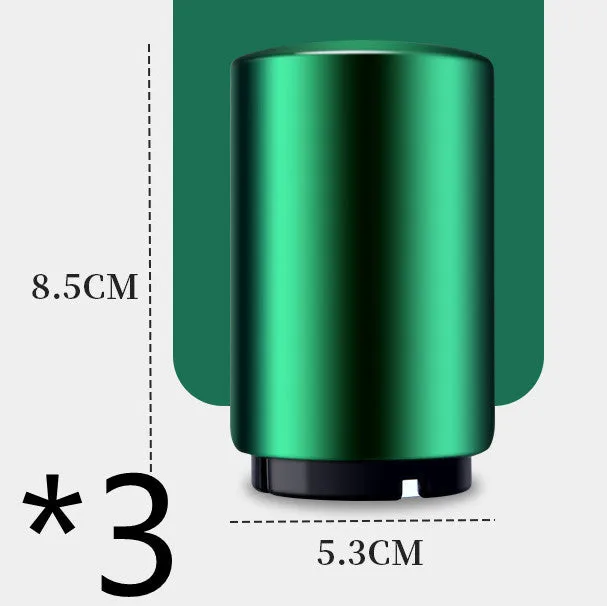 Stainless steel automatic bottle opener on a table, showing its compact size and press-down design.
