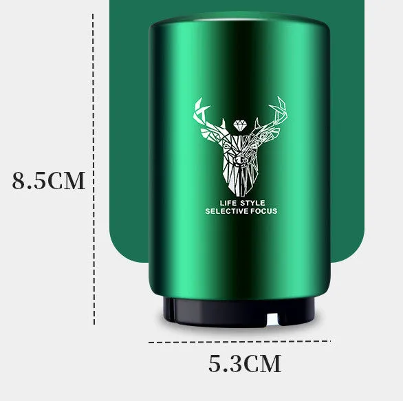 Stainless steel automatic bottle opener on a table, showing its compact size and press-down design.