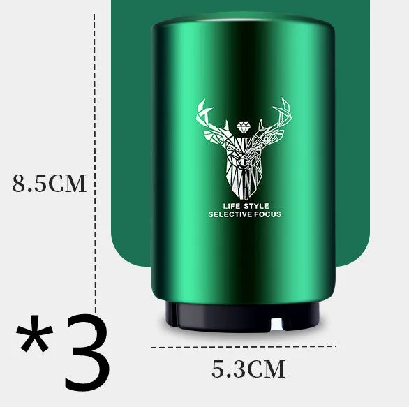 Stainless steel automatic bottle opener on a table, showing its compact size and press-down design.