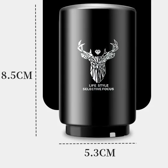 Stainless steel automatic bottle opener on a table, showing its compact size and press-down design.