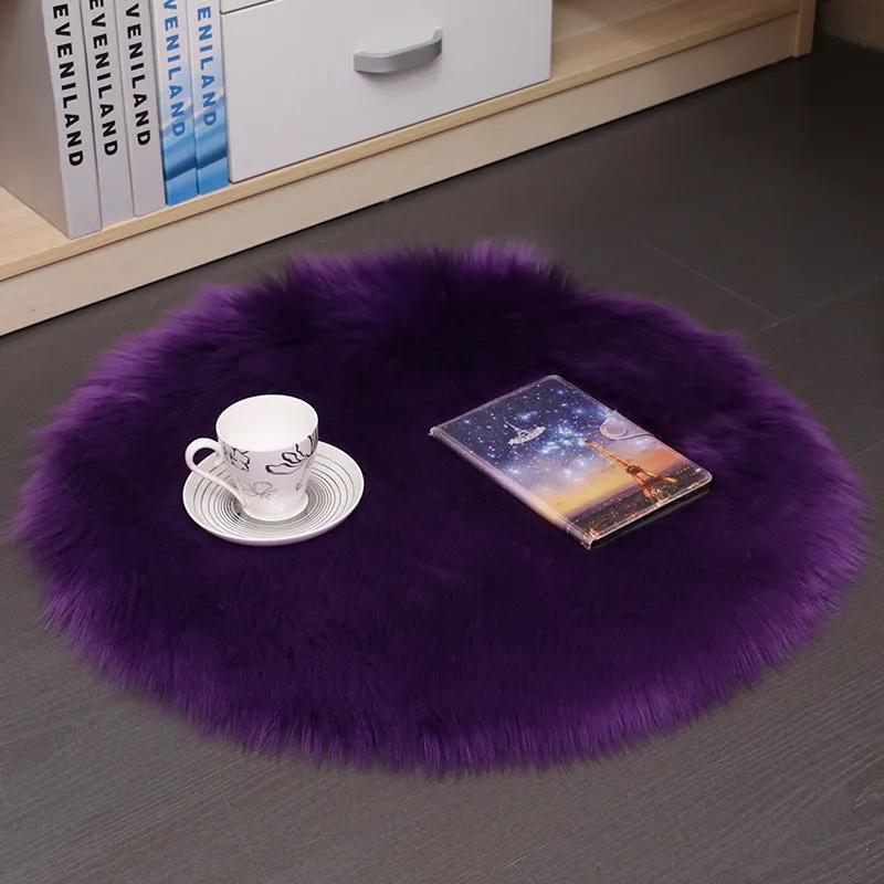 Round beige wool plush carpet floor mat on a wooden floor.