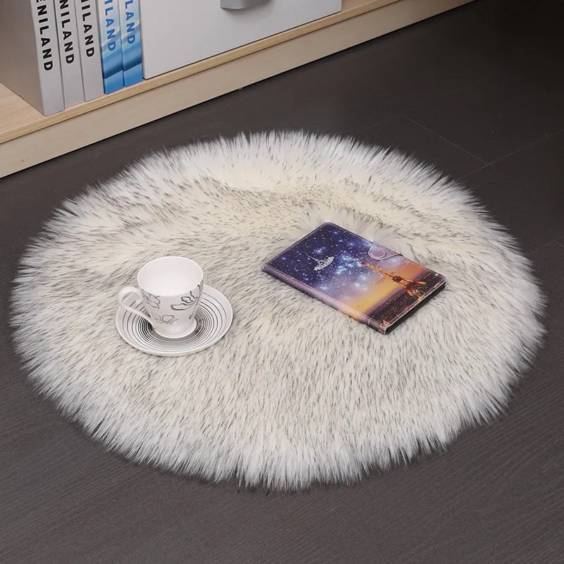 Round beige wool plush carpet floor mat on a wooden floor.